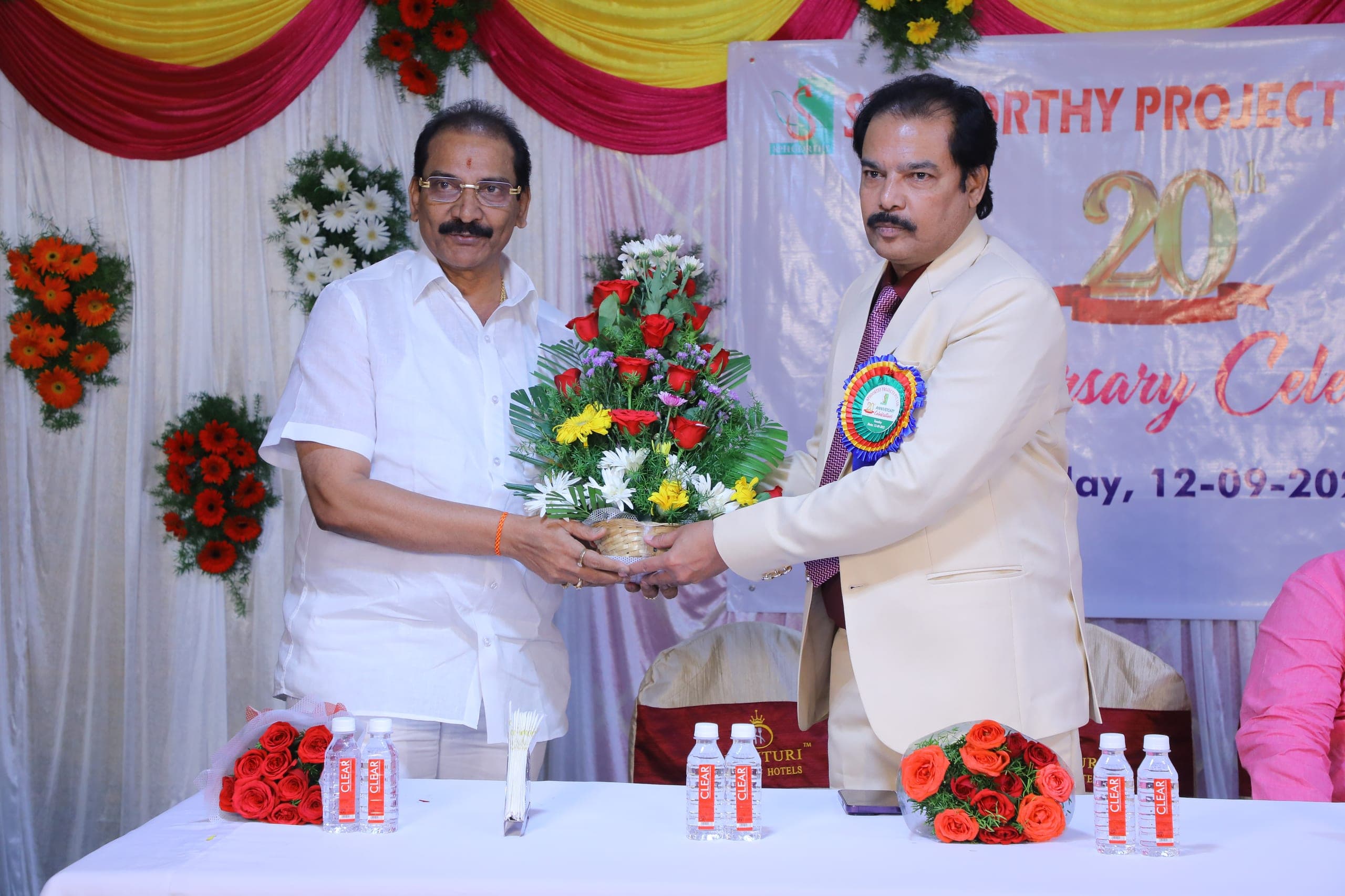 Sphoorthy Projects team and guests at an anniversary event